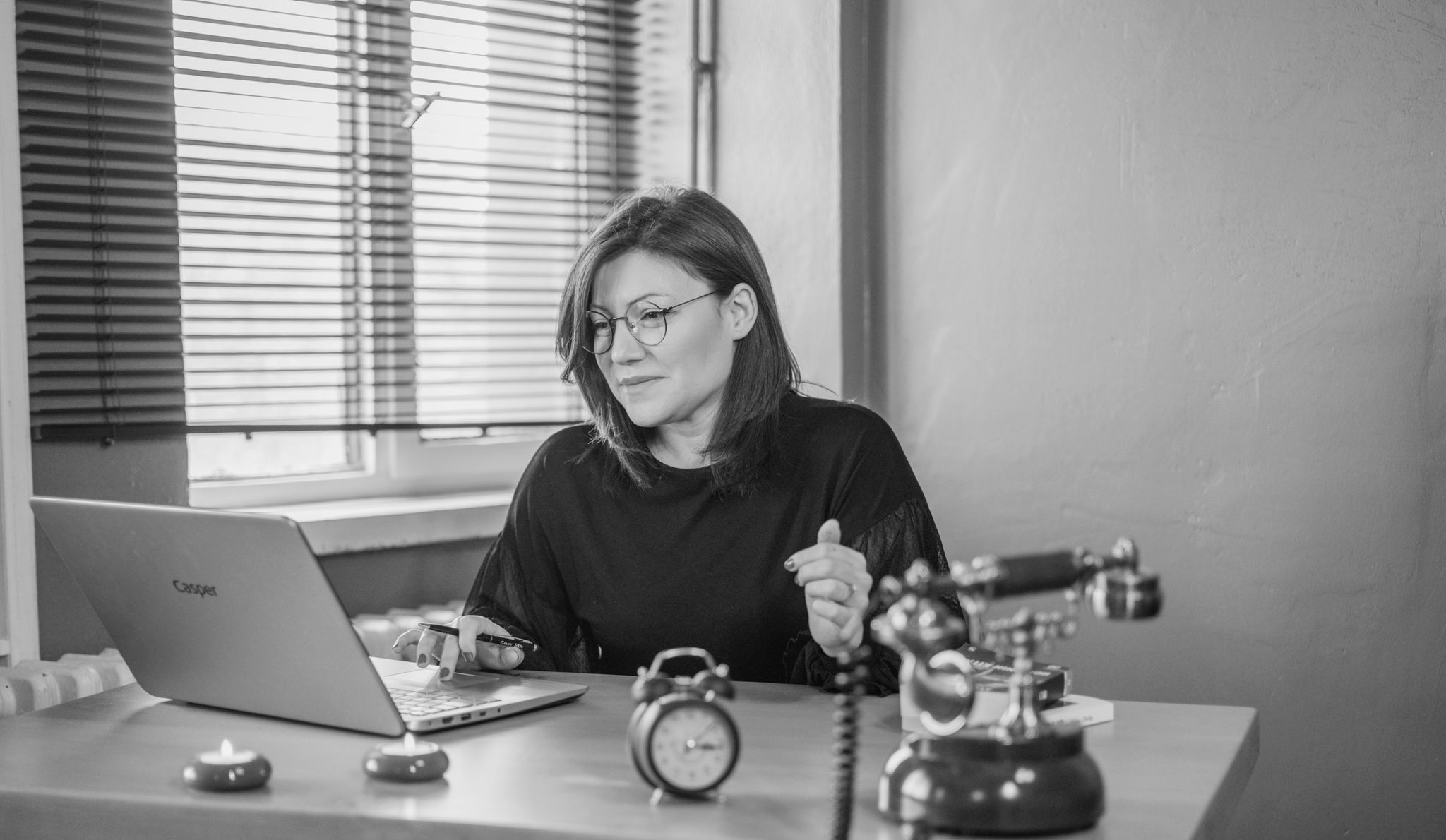 Home A Businesswoman Using A Laptop At Her